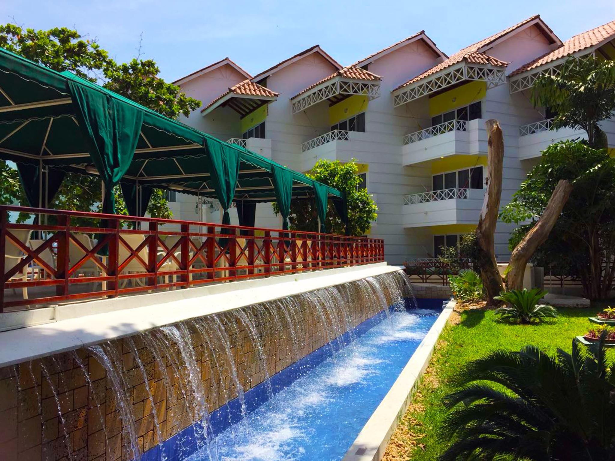 Hotel Las Americas Casa De Playa Cartagena Buitenkant foto The resort's pool