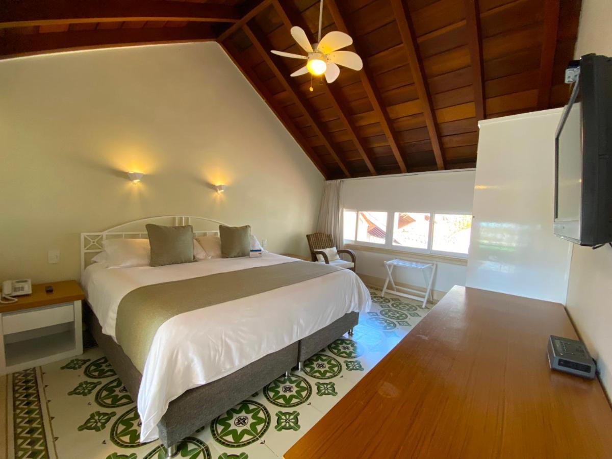 Hotel Las Americas Casa De Playa Cartagena Buitenkant foto A room at the hotel
